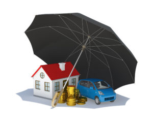 black umbrella sheltering small house, car, and pile of coins